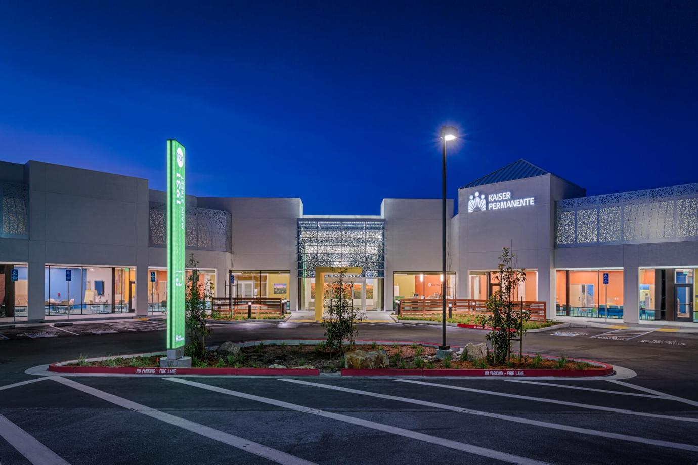 Members are attracted to the entry by a new bright yellow canopy and a large clear glass vestibule which acts as a beacon, especially at night, and arrive in the center of the building.