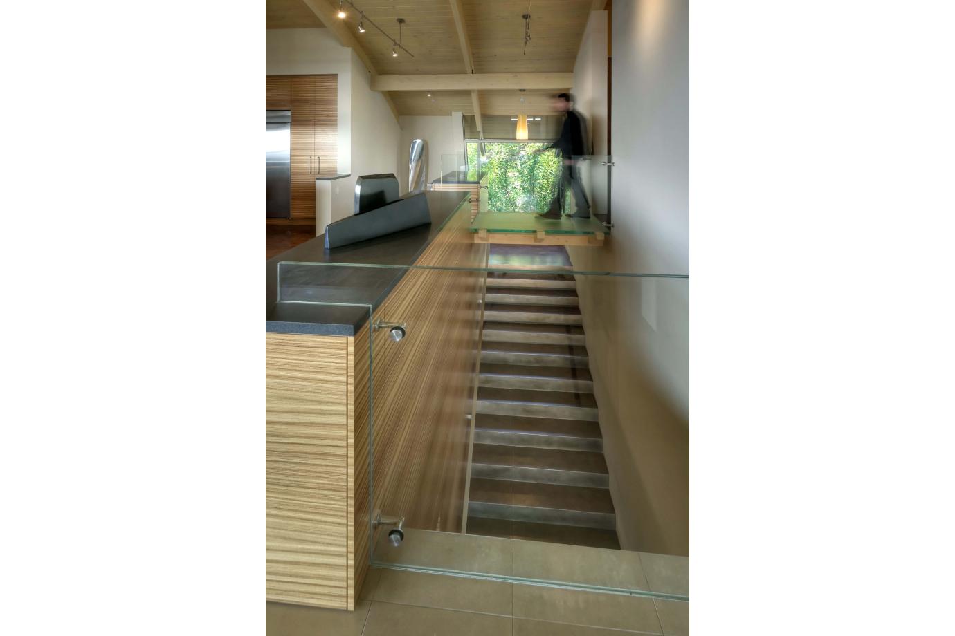 Glass bridge from office to kitchen